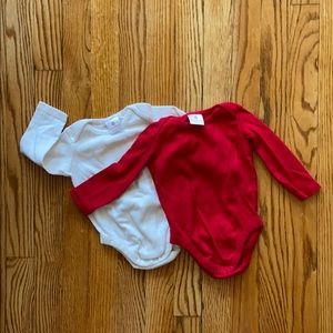 2 Hanna Andersson Onesies 6-12 mth